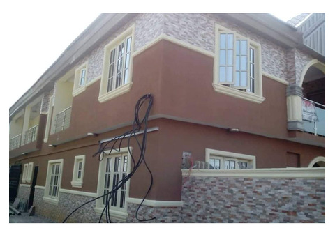 A House with a 4 Bedroom Duplex, 2 Units of 3 Bedroom Flats and a Unit of 2 Bedroom Flat