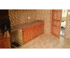 A House with a 4 Bedroom Duplex, 2 Units of 3 Bedroom Flats and a Unit of 2 Bedroom Flat