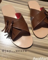 Brown leather slides